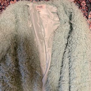 teal fuzzy jacket